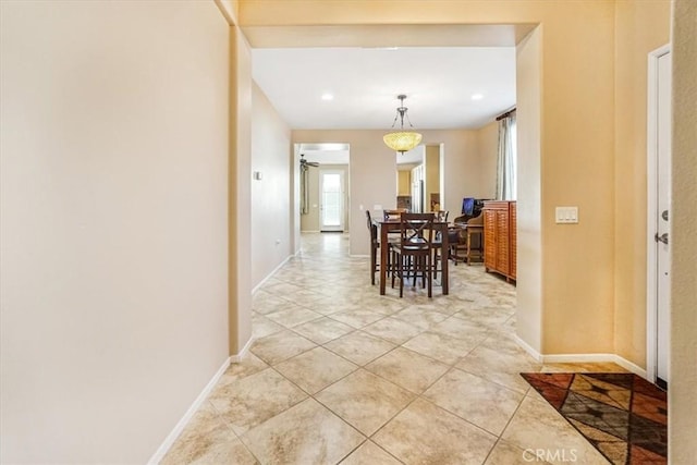 hallway with light tile patterned floors