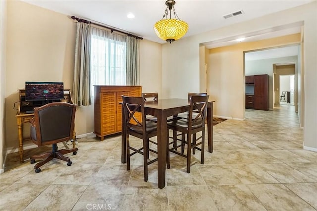 dining room with light tile patterned floors