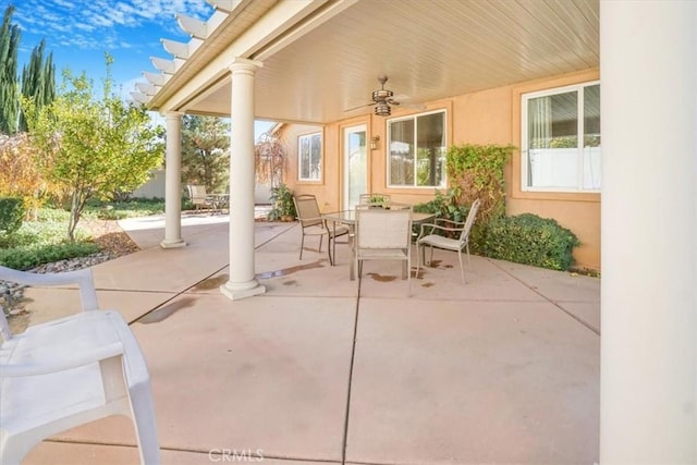 view of patio featuring ceiling fan