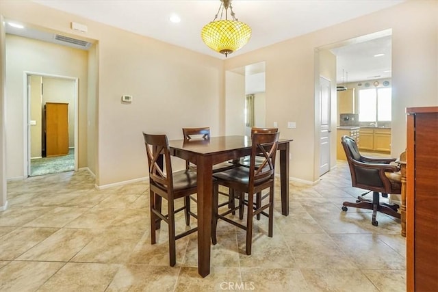 view of tiled dining area