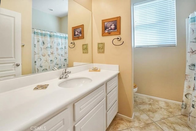 bathroom featuring tile patterned flooring, vanity, toilet, and a shower with shower curtain