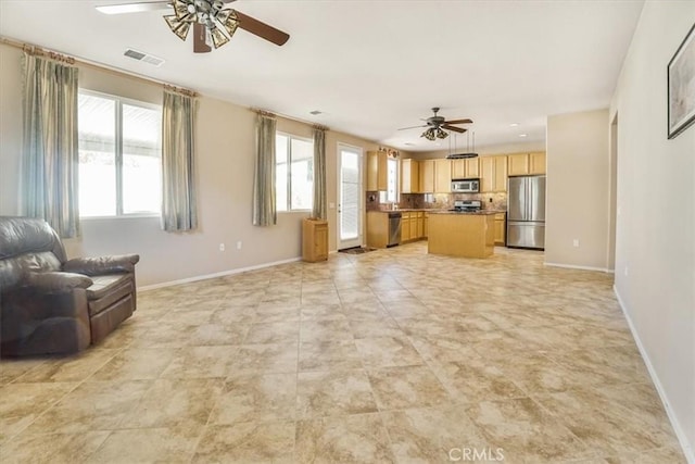 living room with ceiling fan