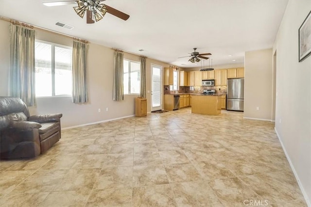 living room with ceiling fan