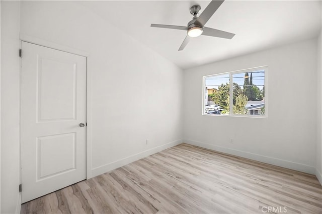 unfurnished room featuring ceiling fan and light hardwood / wood-style flooring