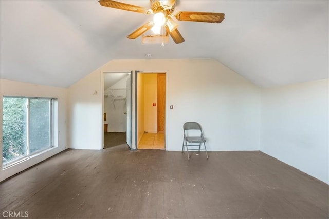 bonus room featuring hardwood / wood-style flooring, ceiling fan, and lofted ceiling