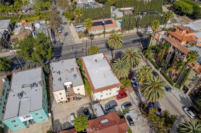 birds eye view of property with a residential view