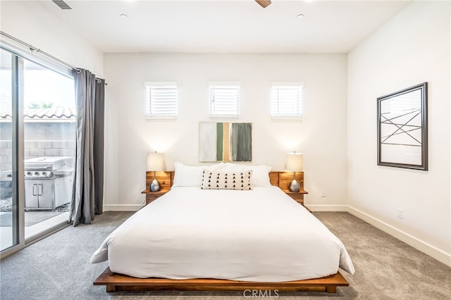 bedroom featuring light carpet, access to exterior, and ceiling fan