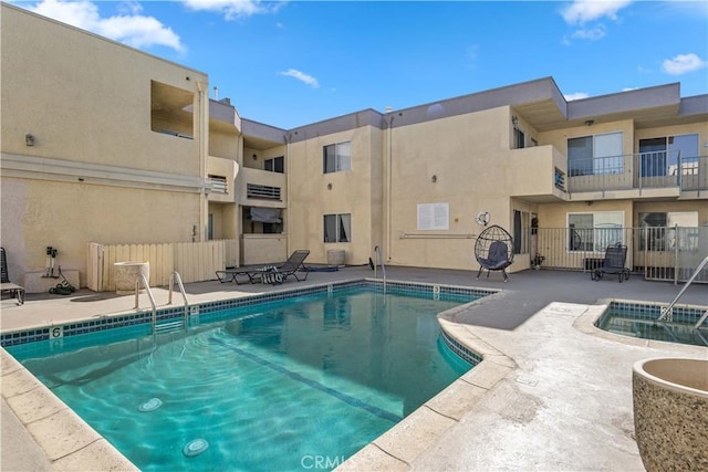 view of pool featuring a patio