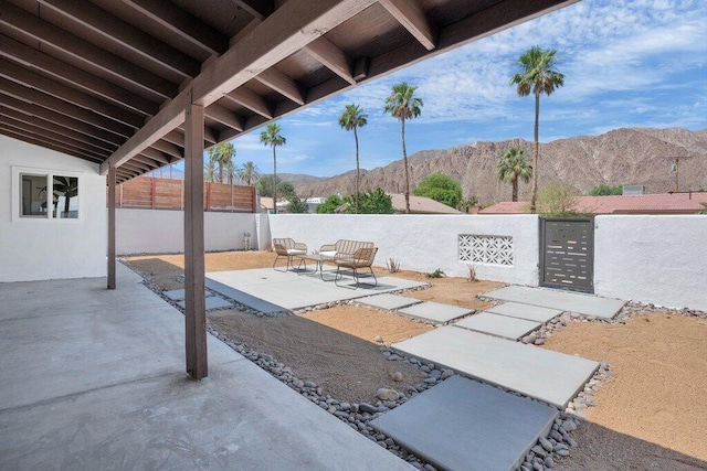 view of patio / terrace with a mountain view