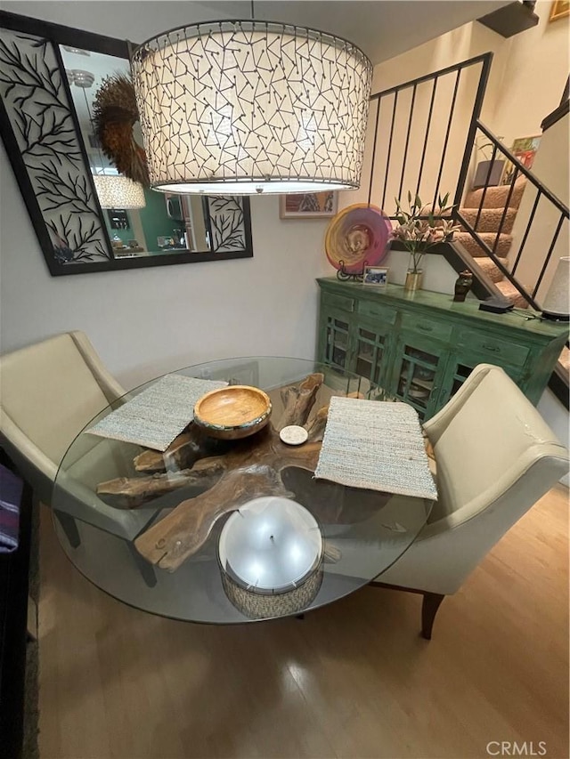 18223 Soledad Canyon Rd Unit 29, Canyon Country, CA 91387 - dining area featuring wood finished floors and stairway