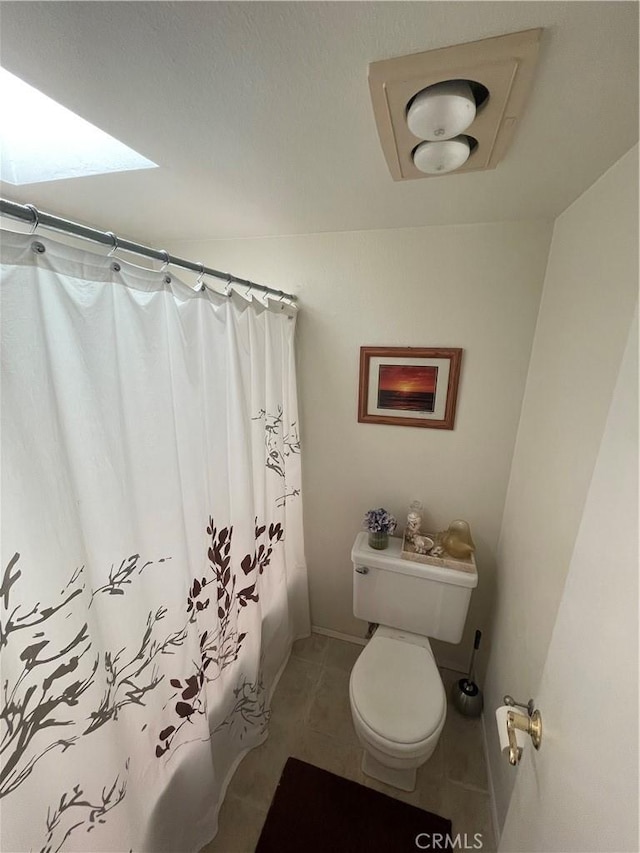 18223 Soledad Canyon Rd Unit 29, Canyon Country, CA 91387 - bathroom featuring toilet, a shower with shower curtain, and tile patterned floors