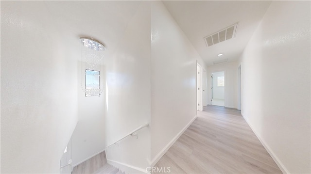 corridor featuring light hardwood / wood-style flooring