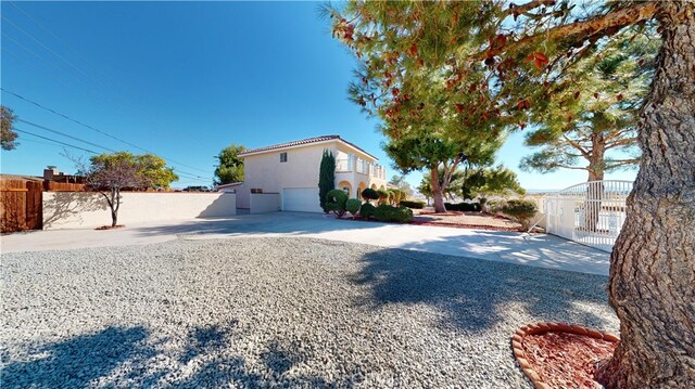 view of yard featuring a garage