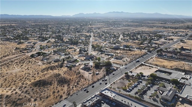 drone / aerial view featuring a mountain view