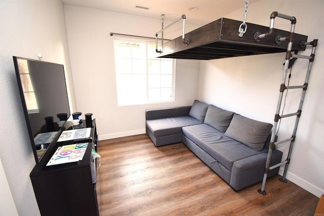 living room with hardwood / wood-style flooring