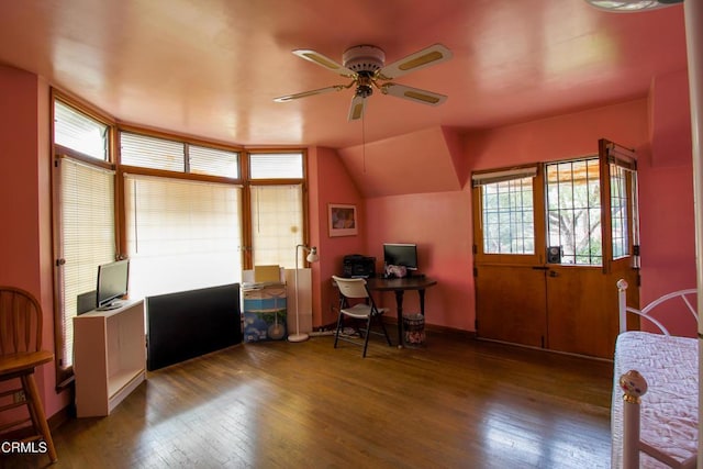 home office with hardwood / wood-style floors, ceiling fan, and lofted ceiling