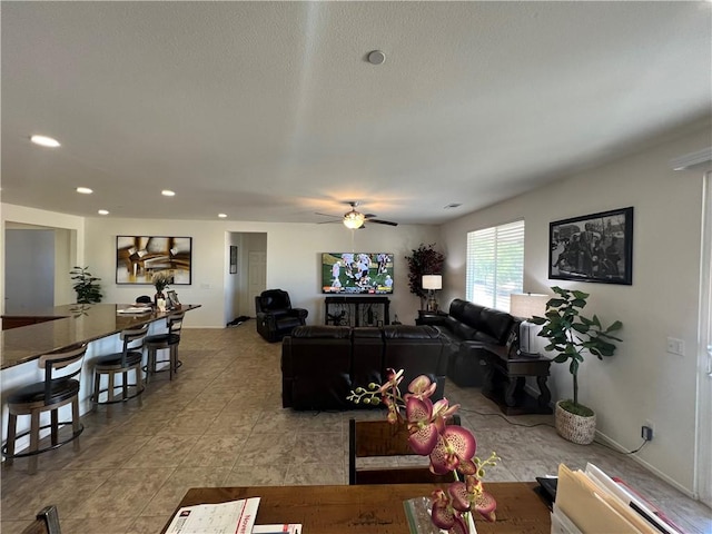 living room featuring ceiling fan