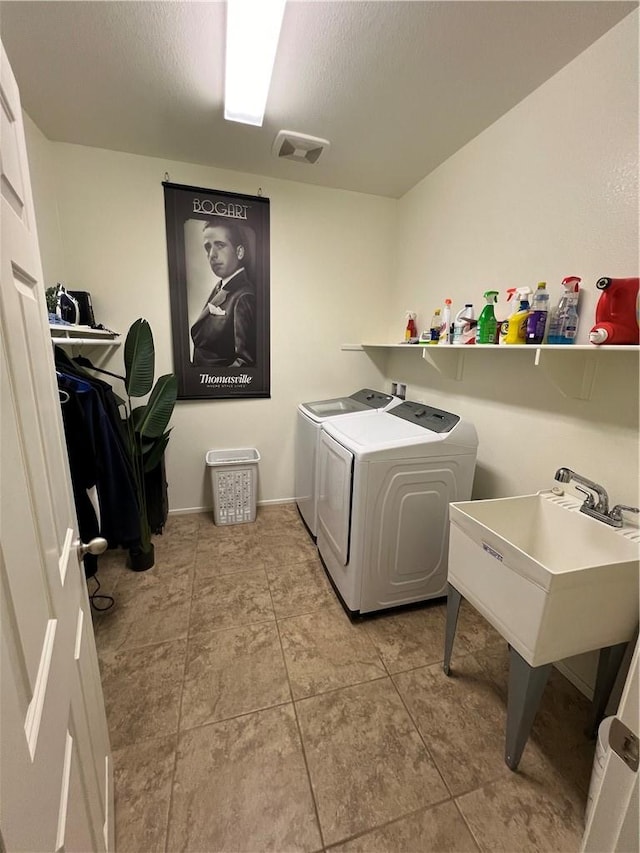 laundry room with separate washer and dryer