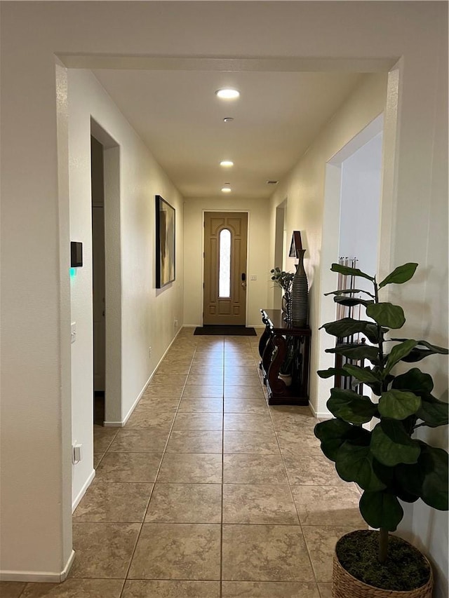 interior space with light tile patterned flooring