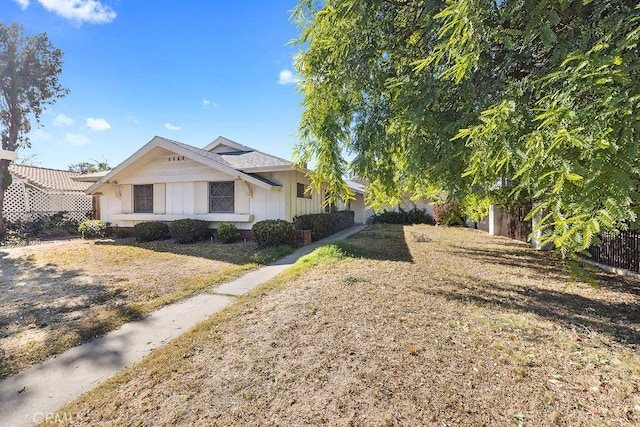 view of property exterior featuring a yard