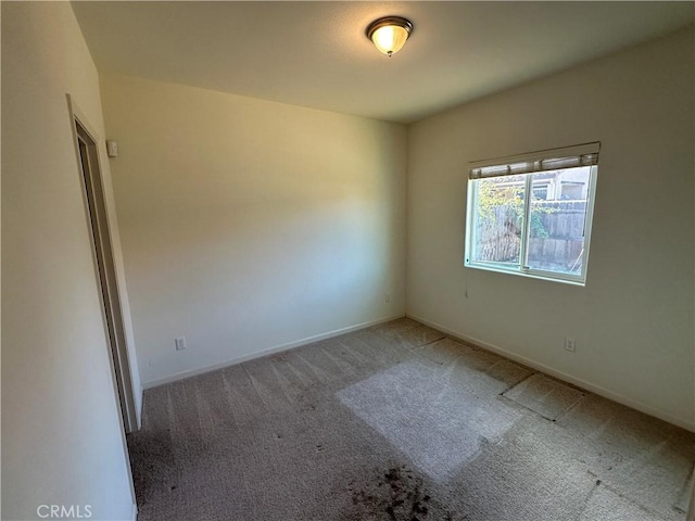 empty room featuring carpet floors