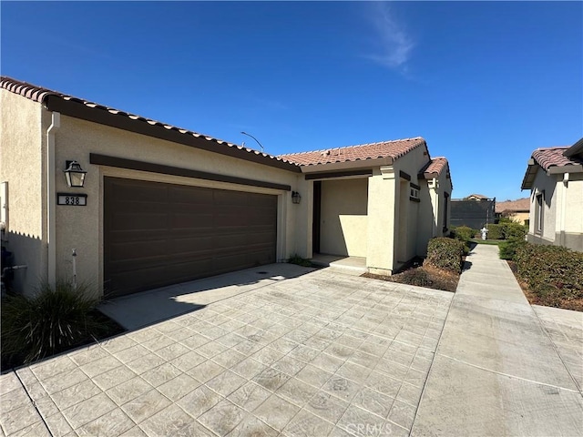 view of front of home with a garage