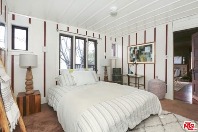 bedroom featuring carpet flooring