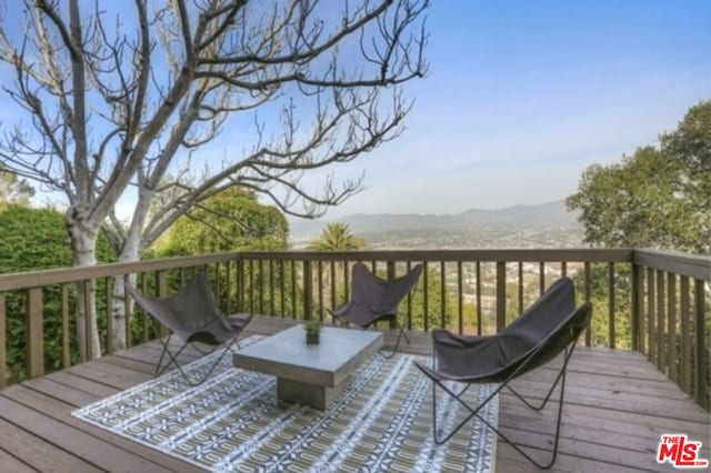 deck featuring a mountain view