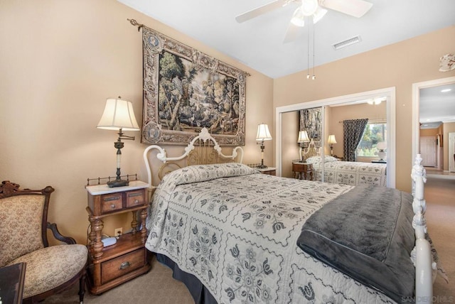 bedroom with ceiling fan, a closet, and carpet