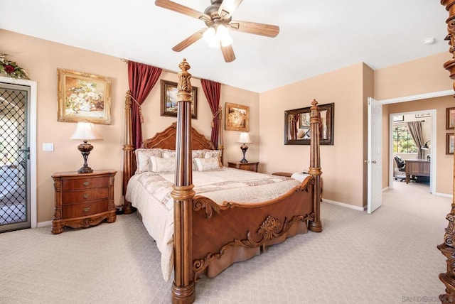 bedroom with ceiling fan and light colored carpet