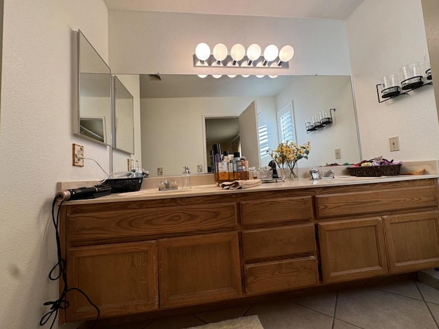 bathroom with vanity and tile patterned floors