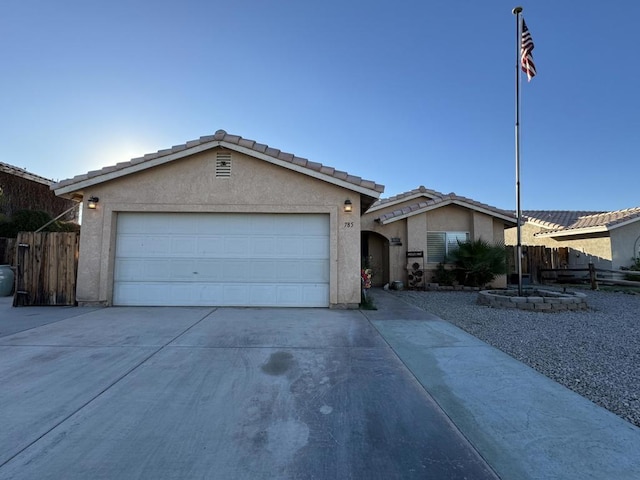 single story home featuring a garage