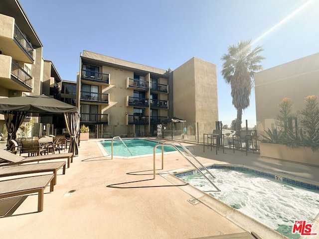 view of pool featuring a patio area