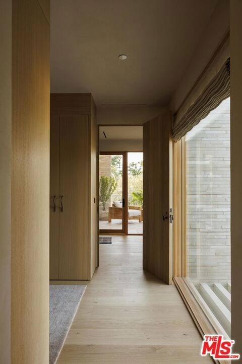 hallway featuring light hardwood / wood-style floors