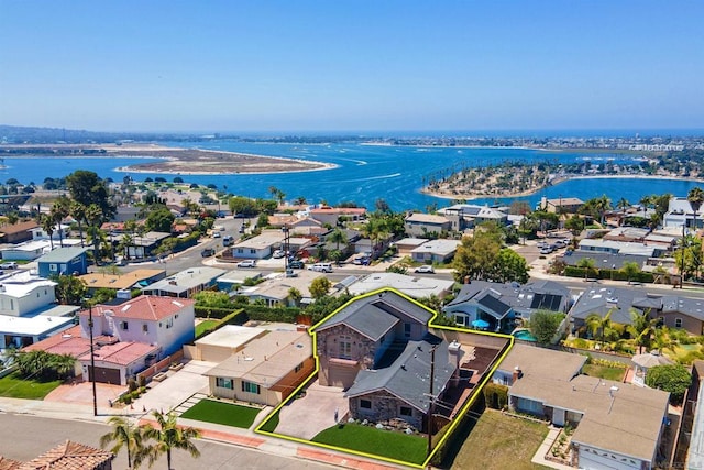 drone / aerial view featuring a water view