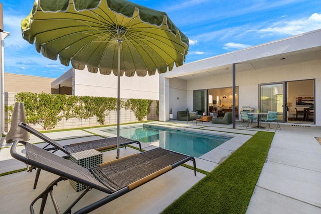 view of pool with a patio