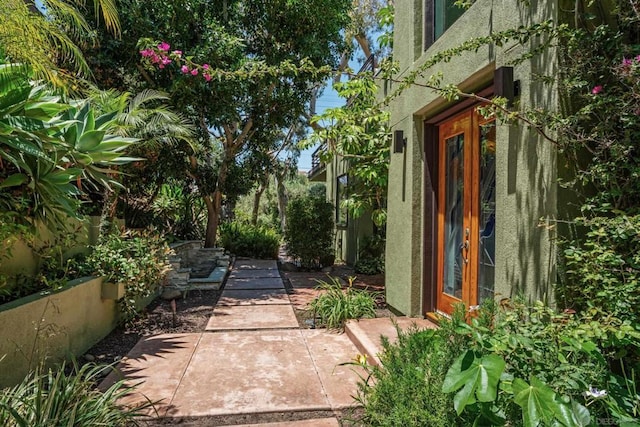 view of yard featuring french doors