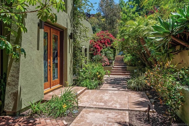 view of yard featuring french doors