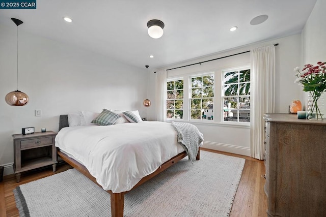 bedroom with wood-type flooring