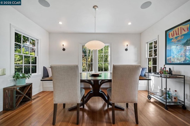 dining space featuring hardwood / wood-style flooring