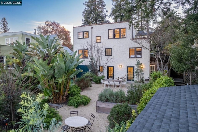 back of house featuring a patio