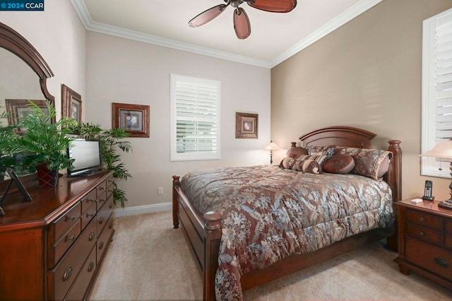 bedroom with ceiling fan, light carpet, and crown molding