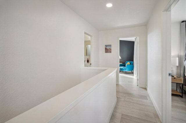 hallway featuring light hardwood / wood-style flooring