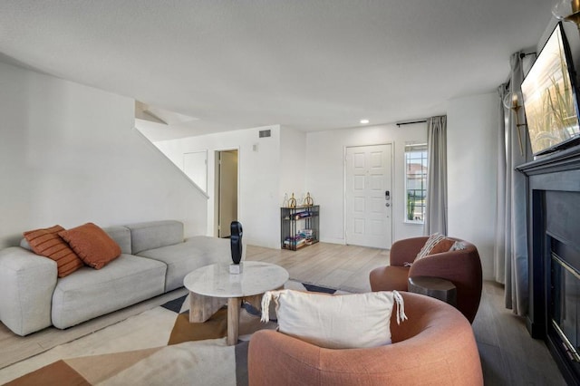 living room with light hardwood / wood-style floors