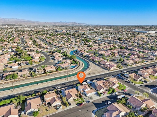 drone / aerial view featuring a mountain view