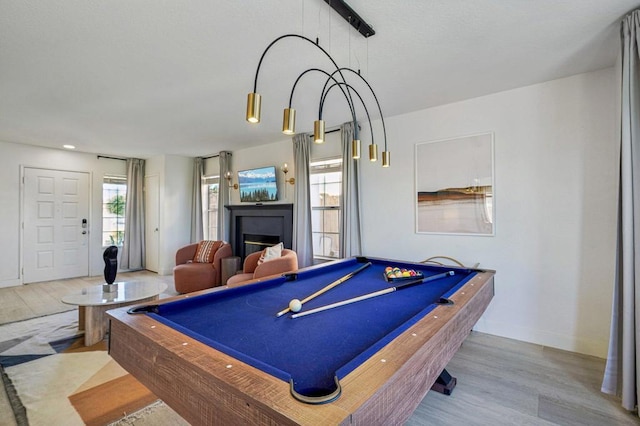 playroom featuring wood-type flooring and pool table