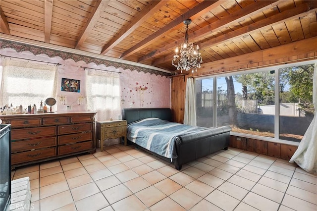 tiled bedroom featuring beam ceiling, wooden ceiling, and a chandelier