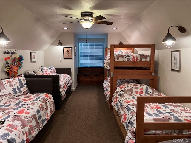 carpeted bedroom featuring a textured ceiling, ceiling fan, and vaulted ceiling