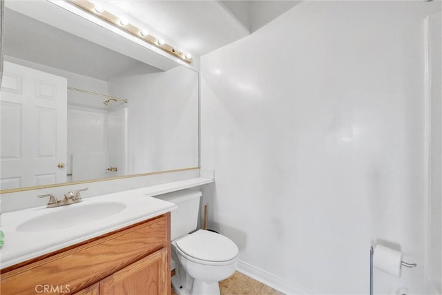 bathroom with tile patterned flooring, vanity, toilet, and a shower