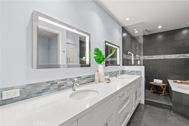 bathroom featuring tile patterned floors, vanity, and separate shower and tub